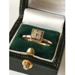 4 STONE DIAMOND RING SET IN YELLOW GOLD