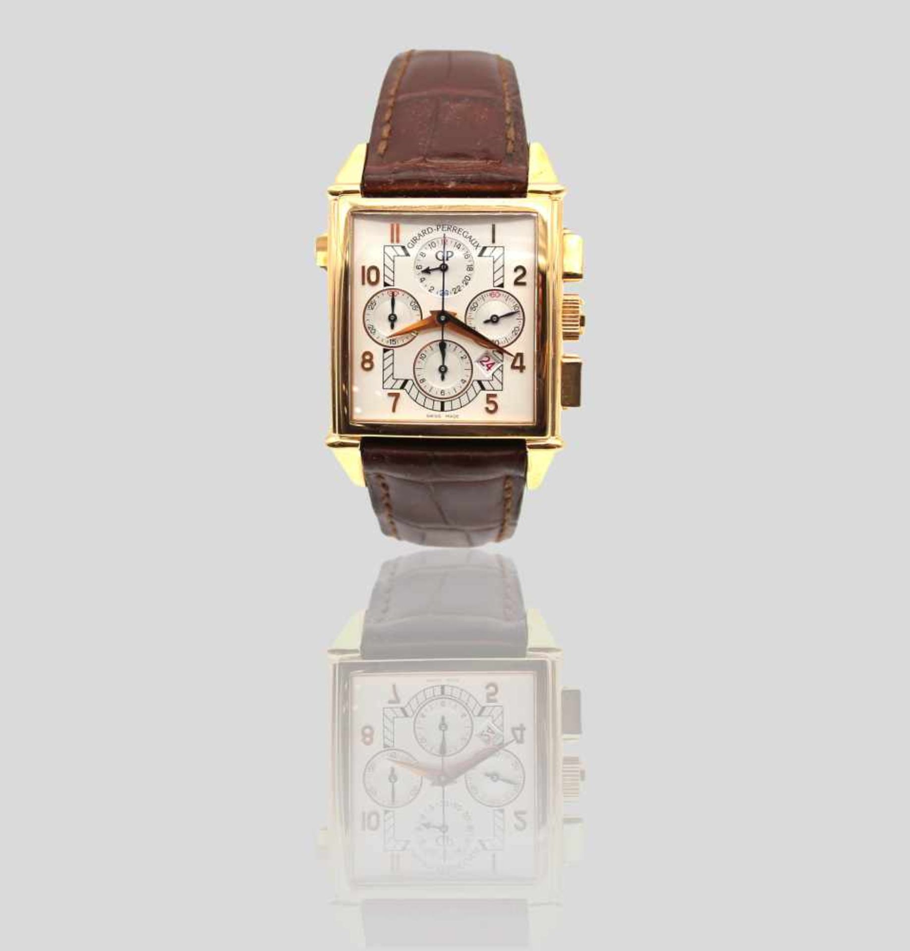 Girard Perregaux Vintage 1945 Herrenarmbanduhr in 750er Gold gearbeitet mit einem Lederarmband, Ref.