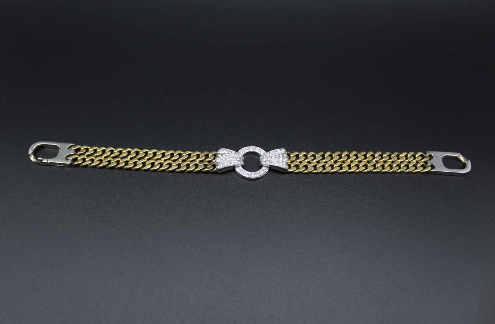 Armband in 750er Gelb/Weißgold gearbeitet mit 52 Brillanten, gesamt ca. 0,57 ct, mittlere - Bild 3 aus 3