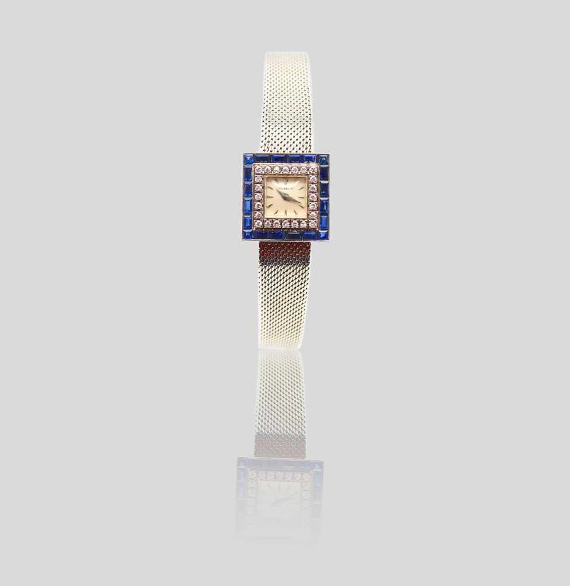 Gübelin Damenarmbanduhr, Handaufzug, in 750er Weißgold gearbeitet, mit Brillanten und Saphiren, 19 x