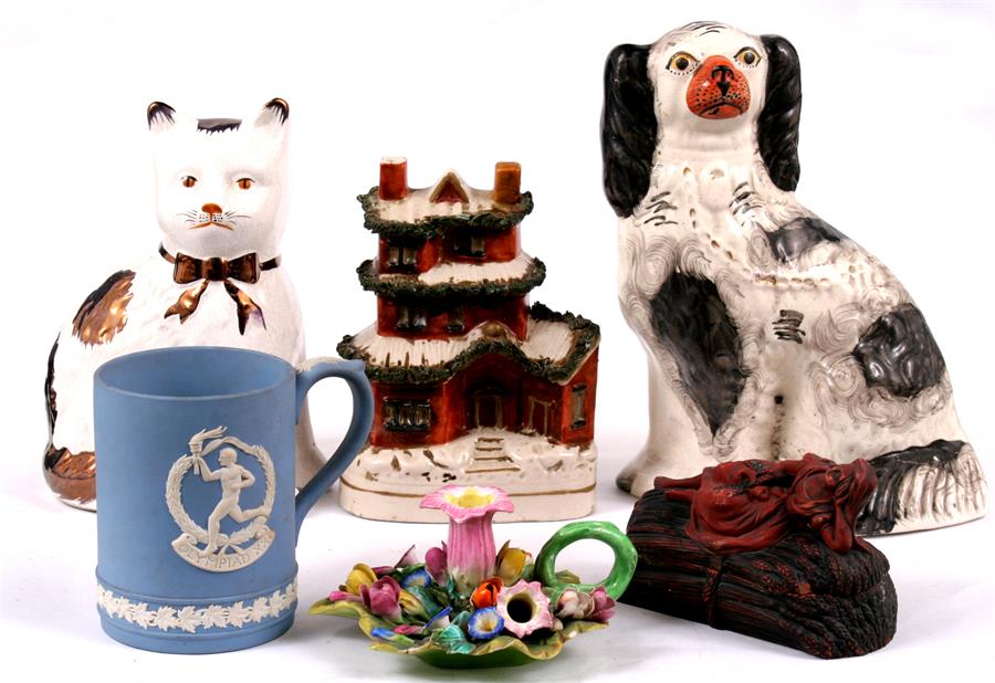 A Staffordshire pottery dog; a pottery house moneybox, a Wedgwood Jasperware tankard; and other