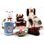 A Staffordshire pottery dog; a pottery house moneybox, a Wedgwood Jasperware tankard; and other