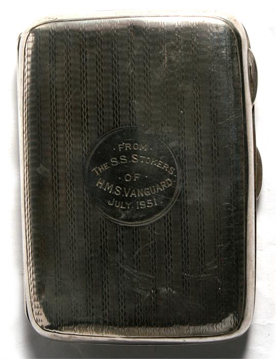 A silver cigarette case, Chester 1915, later inscribed ' from the S.S.Stokers of HMS Vanguard