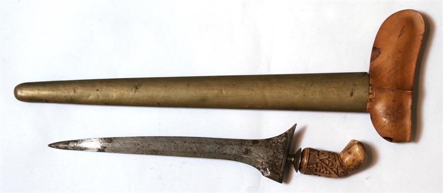 An Eastern dagger, probably an Indonesian Buginese kris, with foreshortened blade and ornately