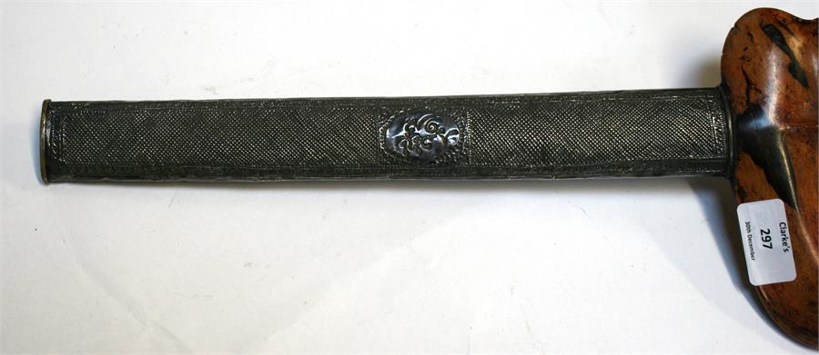 An Indonesian Kris dagger with wavy ornate blade and intricately carved handle, in silver covered - Image 11 of 12