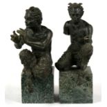 A pair of 19th century Grand Tour satire figures mounted on figured green marble plinths Condition