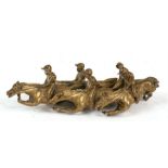 A bronze group of racehorses & jockeys, 14cms (5.5ins) long. Condition Report Loss to the hoof to