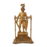 A Victorian gold painted cast iron stick stand in the form of a knight in armour. 86.5cm (34ins)