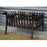 A large iron fire basket, 79cms (31ins) wide.