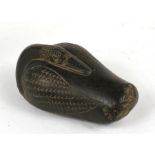 A Persian Assyrian style desk weight in the form of a duck, 14cms (5.5ins) long.