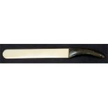 A Victorian horn handled ivory page turner, 51cms (20ins) long.