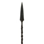 An African tribal spear with metal bound wooden shaft and forged tip, 165cm (65ins) long.