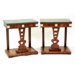 A pair of Art Deco walnut rectangular topped console tables with figured greenstone tops, on pierced