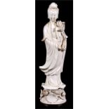 A Chinese blanc de chine in the form of Guan Yin, 35cm (13.75ins) high.