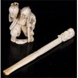 An ivory Netsuke in the form of a man carrying a gourd, 5cms (2ins) high; together with a Chinese