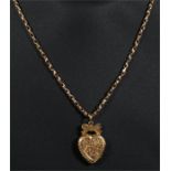 A 9ct gold chain and heart shaped locket.