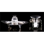 A silver mounted square cut glass inkwell, Birmingham 1922, 8cms (3.25ins) high; together with a