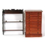 A set of pine collectors drawers with eight long graduated drawers with sectioned interiors,