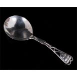 A Georg Jensen leaf & berry pattern sugar spoon.