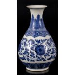 A small Chinese blue & white baluster vase decorated with flowers, blue Qianlong mark to