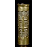 A WWI trench art shell case elaborately decorated in raised relief with the French Cross of Lorraine