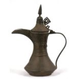 A Turkish / Islamic dallah coffee pot, 26cms (10.25ins) high.