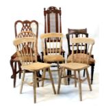 A Carolean style oak chair; a Gillows mahogany chair; three beech kitchen chairs; and other