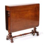 A Victorian mahogany sutherland table on turned supports, 74cms (29ins) wide.