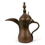 A Turkish / Islamic dallah coffee pot, 27cms (10.5ins) high; together with an Ottoman incense burner