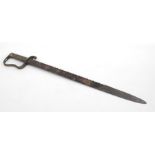 A French saw back sword with brass handle, 69cm (27.25ins) long. Condition Report Loss to the hoof