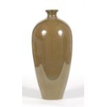 A Chinese monochrome vase, decorated in a mottled olive green glaze, 31cm (12.25ins) high.