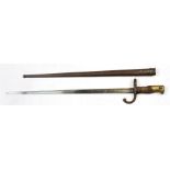 A late 19th century French model 1874 Gras bayonet in steel scabbard, made at the St Etienne Arms