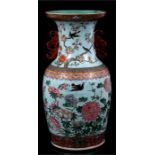 A 19th century Chinese vase decorated with flowers and birds on a turquoise ground, 44cms (17.25ins)