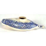 A 19th century blue & white transfer printed baby feeder, 18cms (7ins) long. Condition Report