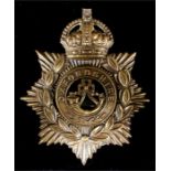 An original early 20th century two-part helmet plate badge to the Oxfordshire Regiment, 11 by