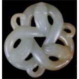 A Chinese jade carving with russet inclusions, in the form of three entwined snakes 5cm (2ins)