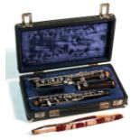 A Howarth of London (Model No. 883) hardwood oboe, cased.