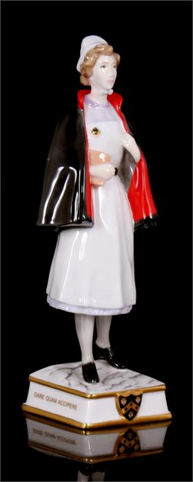 A Royal Worcester figure 'Guy's Hospital 1960's Staff Nurse', 22cms (8.75ins) high.