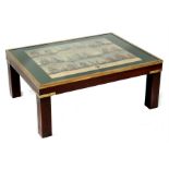 A modern Campaign style mahogany & glass coffee table depicting 19th century French Naval scenes,