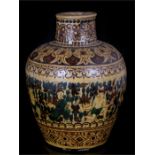 A Bombay School of Art vase decorated with figures and flowers, 32cms (12.5ins) high. Condition