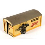 A Schuco tinplate garage, number 1500, 15cms (6ins) wide.