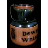 A Royal Doulton Dewar's whisky jug, 13.5cms (5.5ins) high.