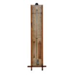 A Victorian Admiral Fitzroy's barometer in an oak case, 99cms (39ins) high.