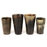 Four 19th century horn beakers, the largest 14cms (5.5ins) high (4).