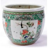 A Chinese famille rose fish bowl, decorated with birds and flowers within panels, 42cms (16.5ins)