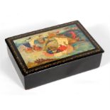 A Russian lacquer box with painted nautical scene to the lid, 15.5cms (6.25ins) wide.