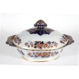 A large Victorian Davenport tureen decorated with flowers with gilt highlights, 38cms (15ins)