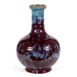 A Chinese ox blood vase with impressed seal mark to underside, 30cms (12ins) high. Condition