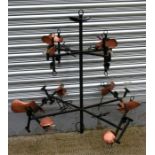 A modern copper and wrought iron ceiling light