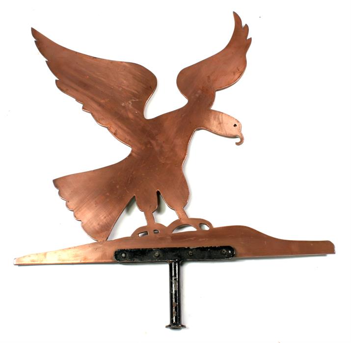A copper weather vane in the form of an eagle, 69cms (27ins) high.